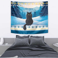 Blue winter tapestry showing a black cat above snow with “Merry Christmas” headline