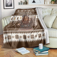 Brown Christmas Belsnickel blanket with 'CHEER OR FEAR' text and snowflake border