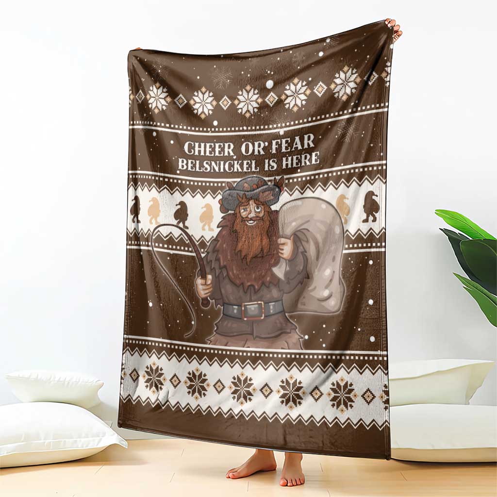 Brown Christmas Belsnickel throw blanket with 'BELSNICKEL IS HERE' and festive pattern