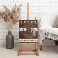 Brown Belsnickel canvas wall art on easel; shows “Cheer or Fear” holiday phrase.