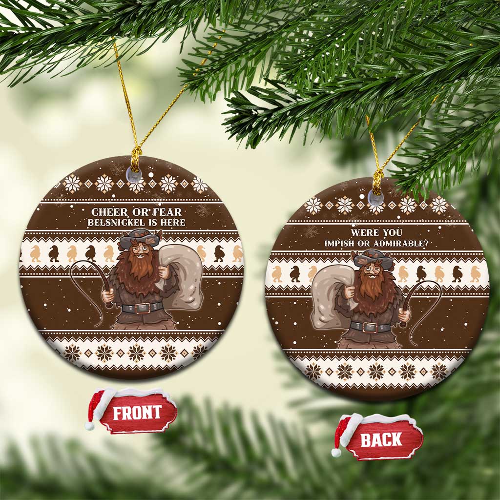 Brown ceramic circle Christmas ornament with Belsnickel text and hanging gold cord.