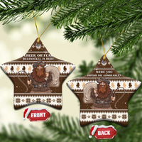 Brown ceramic star-shaped ornaments hanging, “Cheer or Fear” and “Were you impish or admirable?”