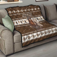Brown Christmas quilt draped over a sofa with “CHEER OR FEAR” text and Belsnickel graphic