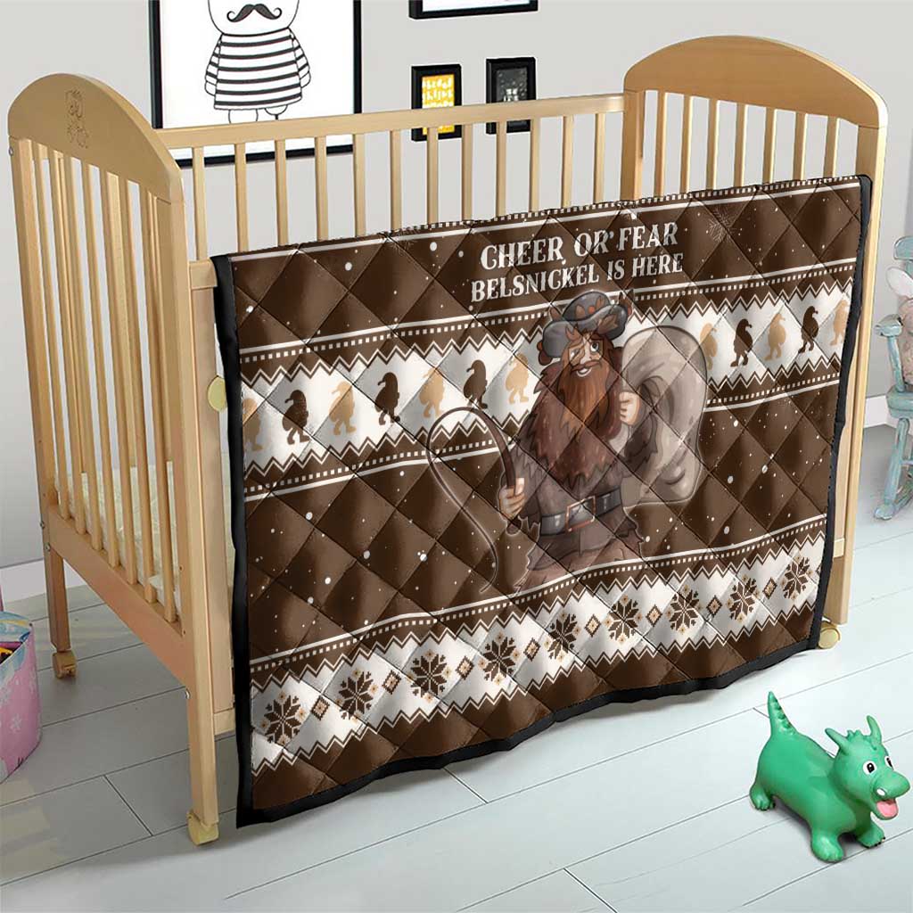 Brown Christmas quilt on a baby bed with “CHEER OR FEAR” text and Belsnickel figure