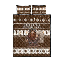 Brown quilt bed set with two pillow shams, Belsnickel illustration, fair-isle snowflake borders