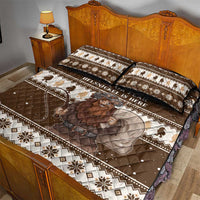 Brown quilt bed set with two pillows, large Belsnickel graphic on fair-isle snowflake background