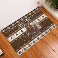Brown Christmas rubber doormat with Belsnickel holding reins and 'Cheer or Fear' wording