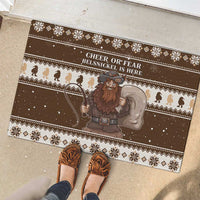 Brown rubber Christmas doormat with Belsnickel cartoon and 'Cheer or Fear' lettering