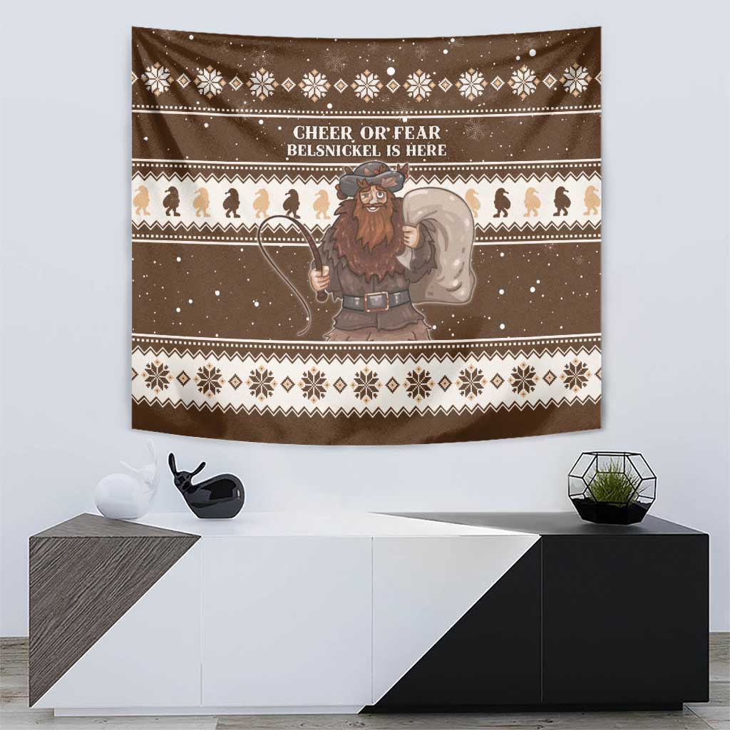 Brown tapestry with Belsnickel holding staff, white lettering, and reindeer border