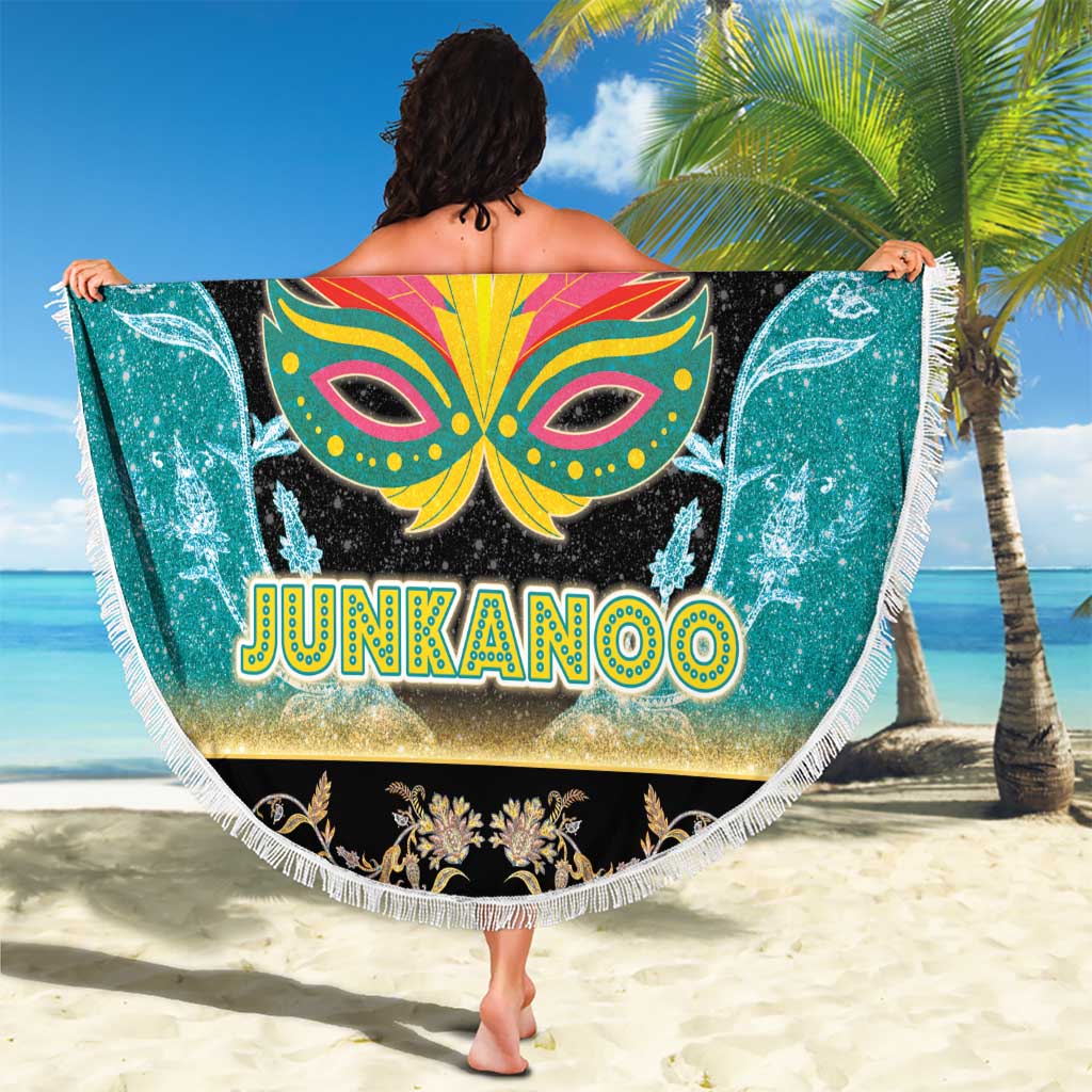 Round Junkanoo beach blanket with fringe edge, colorful mask and 'JUNKANOO' text