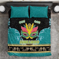 Junkanoo-themed bedding set with teal and black duvet, gold border, and matching pillow shams