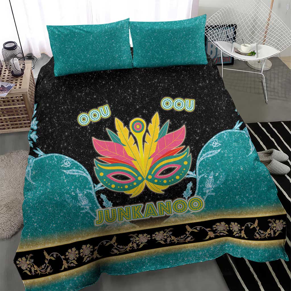Junkanoo-themed bedding set with teal side panels, black center, and Junkanoo mask print