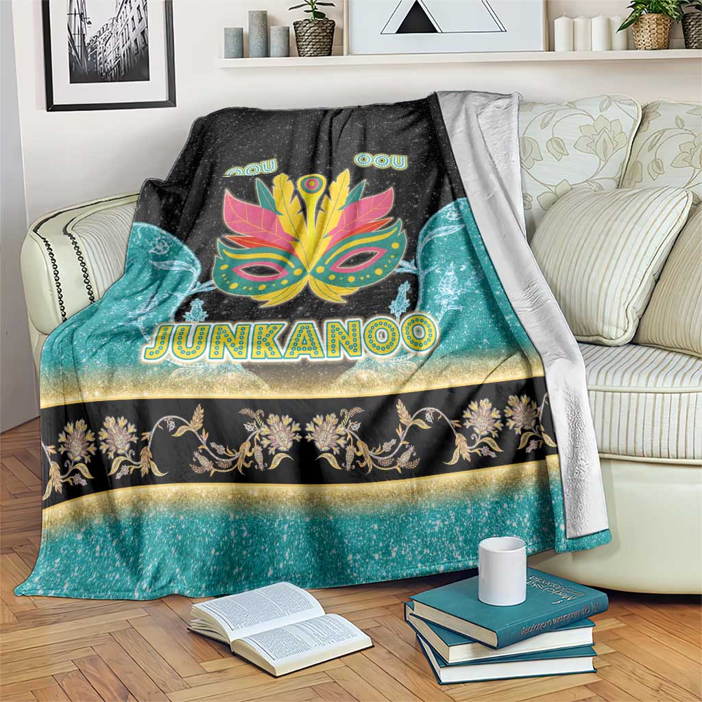Junkanoo blanket with black top, teal bottom, gold band, and neon carnival mask graphic