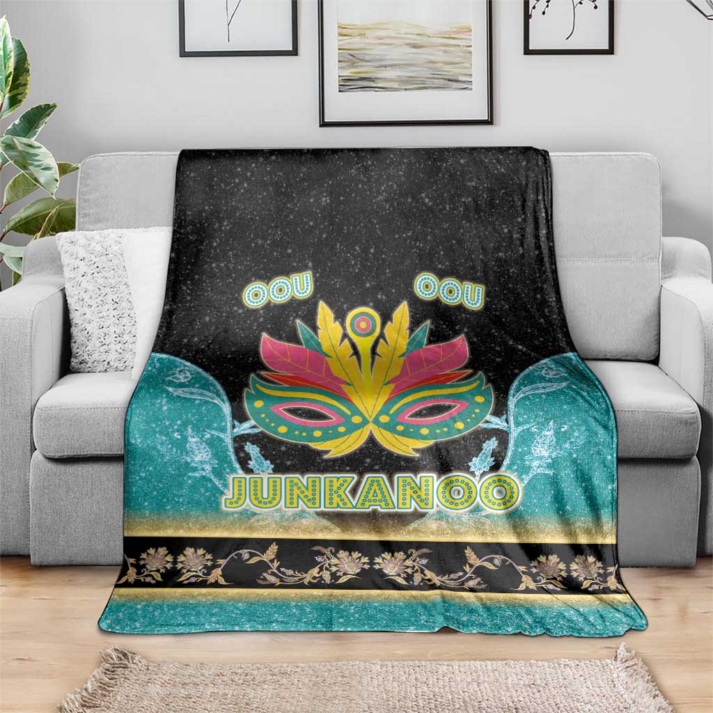 Junkanoo blanket in black, teal, and gold with neon carnival mask and 'JUNKANOO' lettering