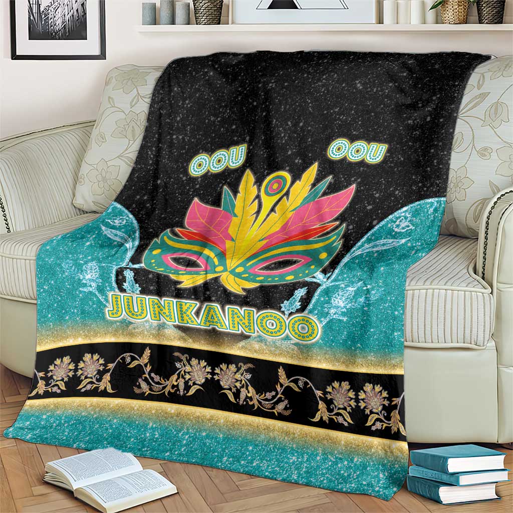 Junkanoo blanket covering couch, black and teal gradient with neon mask and gold trim