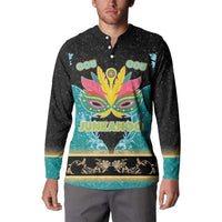 Black button-front sweatshirt with colorful mask graphic and Junkanoo wordmark, worn by model