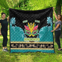 Junkanoo-themed quilt, black top with central carnival mask, teal panels, 'JUNKANOO'