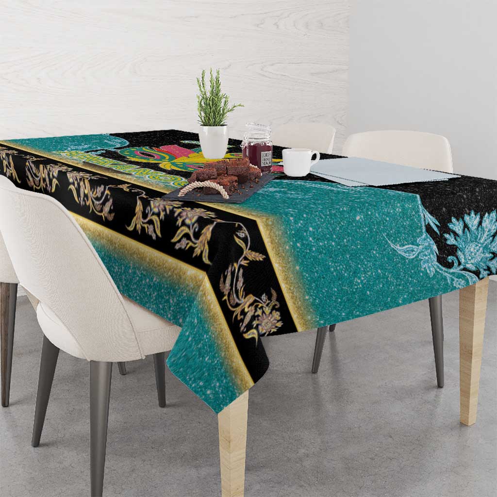 Rectangular tablecloth corner view: teal textured print with black panel and gold ornaments