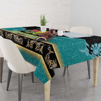 Rectangular tablecloth corner view: teal textured print with black panel and gold ornaments