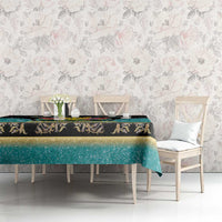 Dining table tablecloth: teal glitter-like fabric with black band and gold ornate detailing