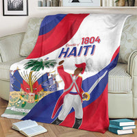 Haiti independence day blanket draped on a couch, with 1804 Haiti lettering and figure