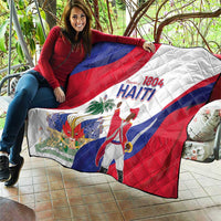 Haiti independence quilt draped outdoors, red white and blue flag with "1804 HAITI"
