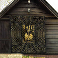 Haiti 1804 quilt hung indoors, dark geometric design with gold “HAITI 1804” crest