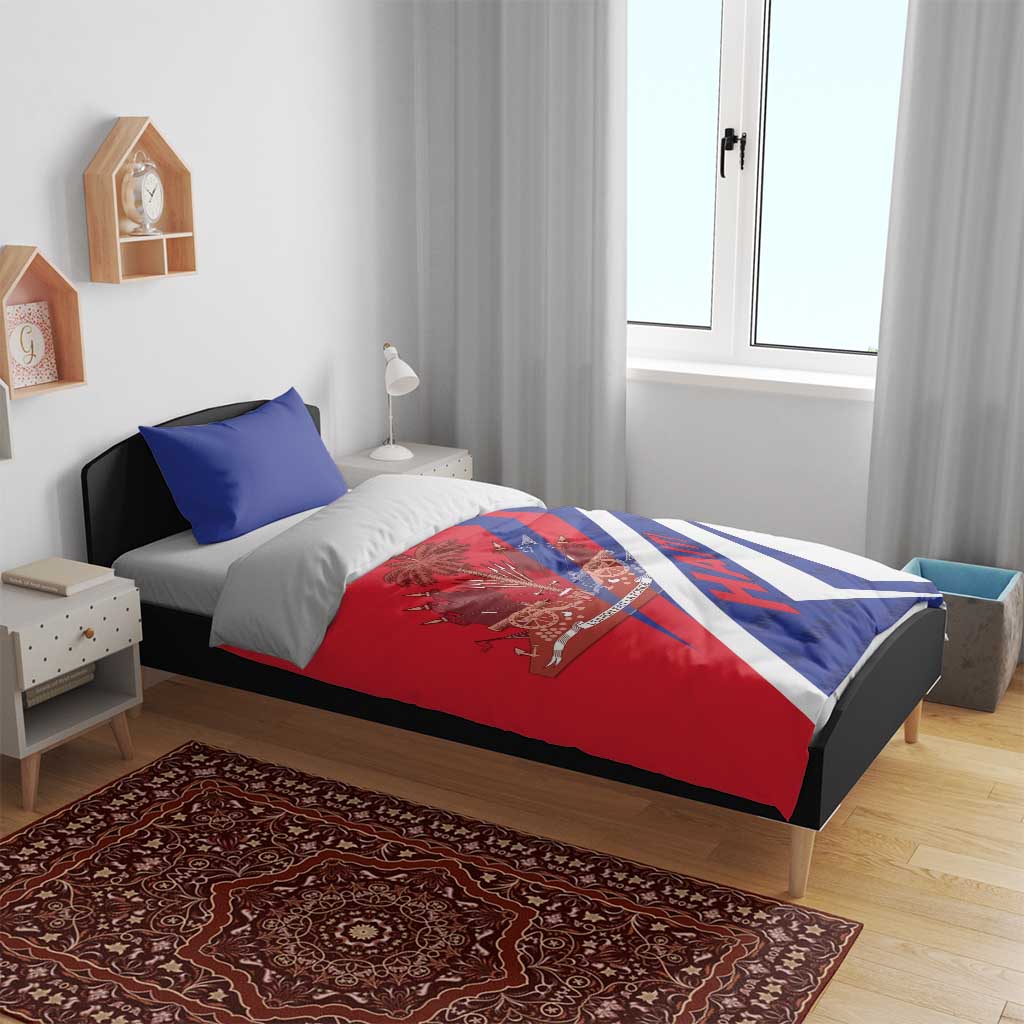 Haiti bedding set on bed with red duvet, coat of arms graphic, blue-and-white diagonal stripe, two pillows