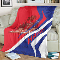 Haiti flag blanket over an armchair, red white blue diagonal stripe coat of arms