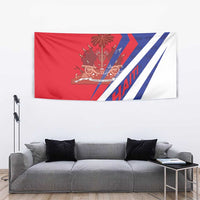 Red and white Haiti coat of arms tapestry with blue chevron and diagonal stripes.