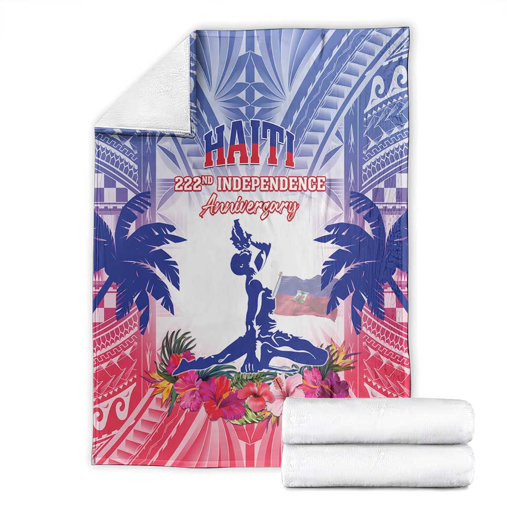 Haiti independence blanket on bed in blue and pink with palm trees, flowers, and statue