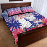 Haiti-themed blue and pink quilt with white center, flowers, and two matching pillow shams