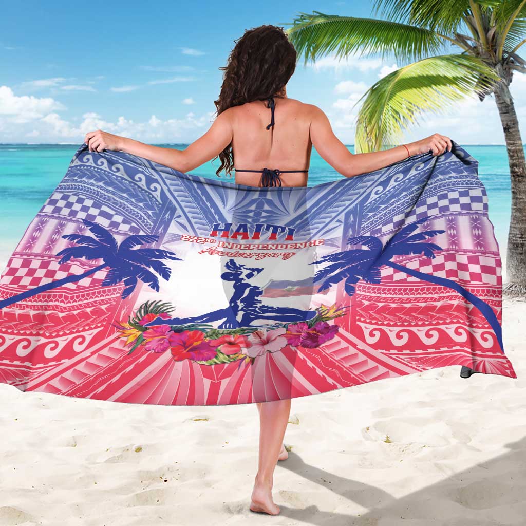 Haiti sarong wrap in blue and pink with palm, floral, and checkered banding