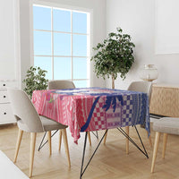Rectangular Polynesian-style tablecloth in blue and maroon with patterned border