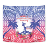 Close-up Haiti Independence tapestry: blue, pink and red design with central statue and flowers.