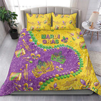 Mardi Gras bedding set: purple and gold glitter comforter with decorative mask and two pillows