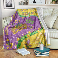 Mardi Gras glitter style throw blanket, purple and gold with masquerade masks and trumpet icons