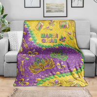 Mardi Gras glitter blanket in purple and gold with masks, bead garlands, and trumpet accents