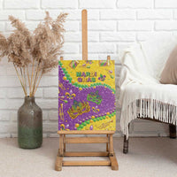 Glitter Mardi Gras canvas wall art on a wooden easel, with beads and fleur-de-lis