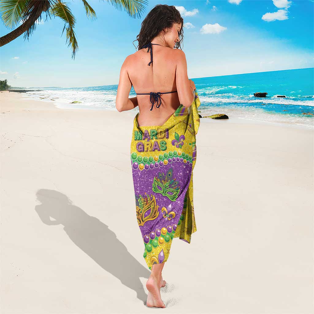 Mardi Gras glitter sarong with back view: purple and gold panel with bead motifs