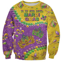 Glitter sweatshirt with purple, gold, green Mardi Gras masks and beads, crew neck