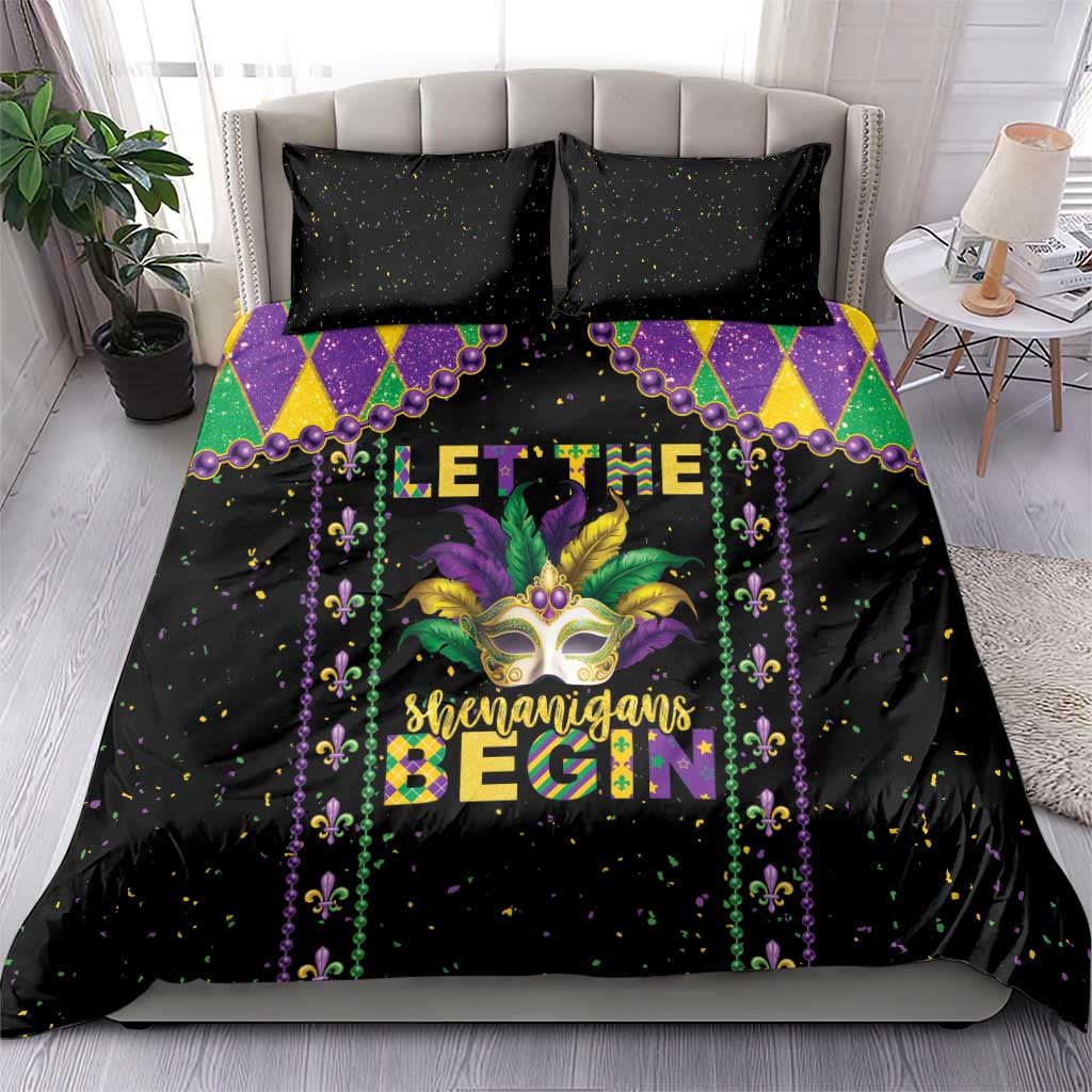 Black Mardi Gras bedding set with colorful diamond pattern, masked face art, and 'Shenanigans' text
