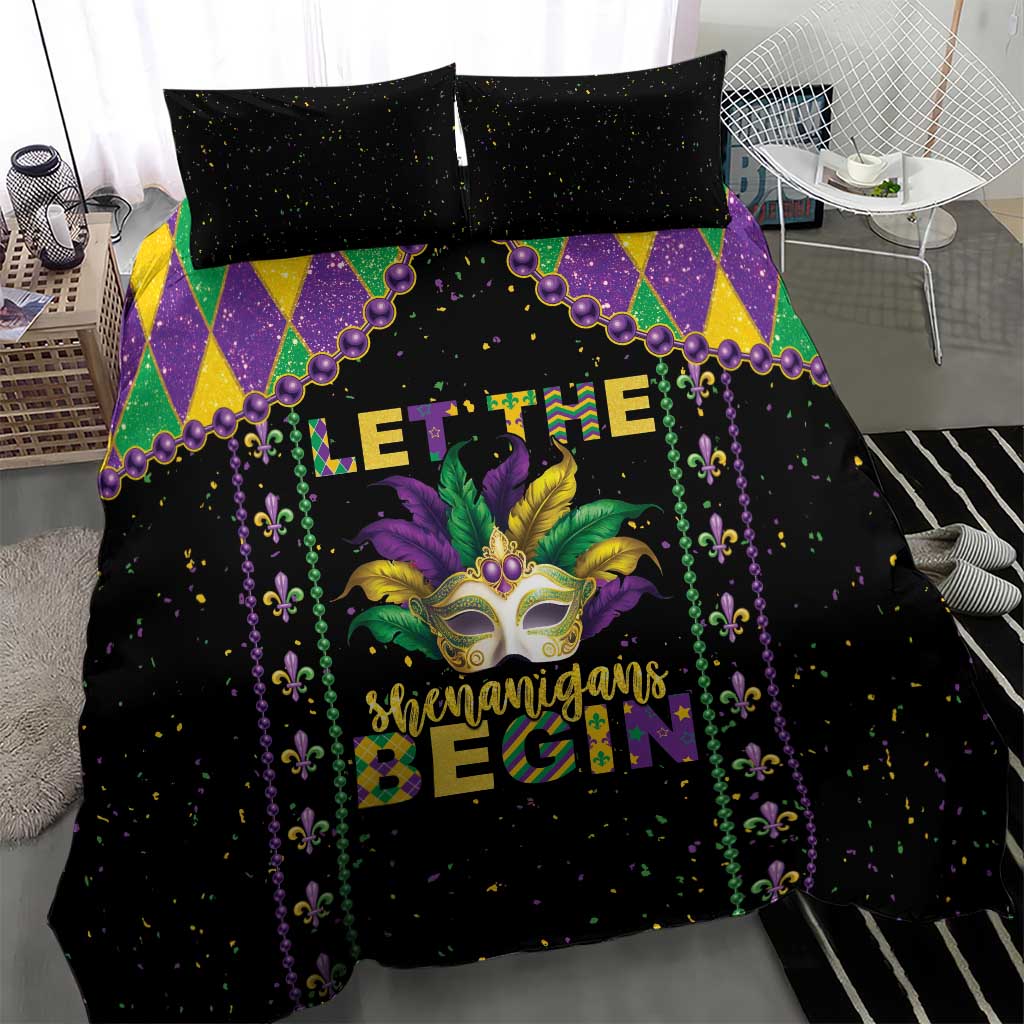 Black Mardi Gras bedding set with colorful diamond panel and masked face graphic on the duvet