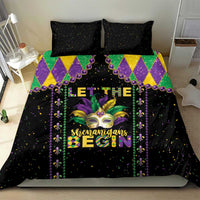 Black Mardi Gras bedding set with colorful diamond border and masked face design centered on duvet