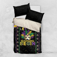 Black Mardi Gras bedding set with diamond border design, masked face graphic, and two matching pillowcases