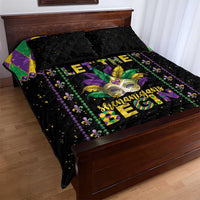 Black quilt bed set with Mardi Gras fleur-de-lis and beads, purple/yellow panels, matching shams