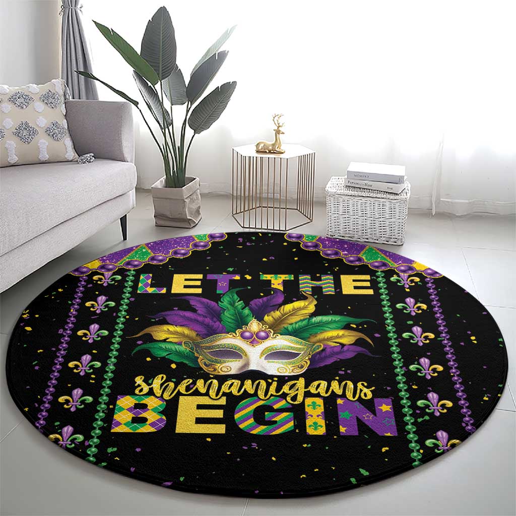 Black round Mardi Gras carpet with colorful fleur-de-lis and mask graphic