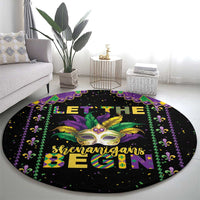 Black round Mardi Gras carpet with colorful fleur-de-lis and mask graphic