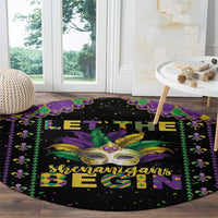 Round black Mardi Gras area rug with “Let the shenanigans begin” design