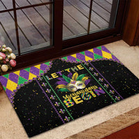 Black Mardi Gras rubber doormat with fleur-de-lis mask and Shenanigans script, check accents